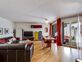 Idéalement situé, appartement en location avec terrasse et jardin