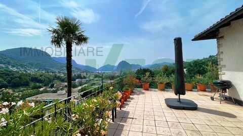 Cozy two-family house with wonderful view on the lake and on Lugano