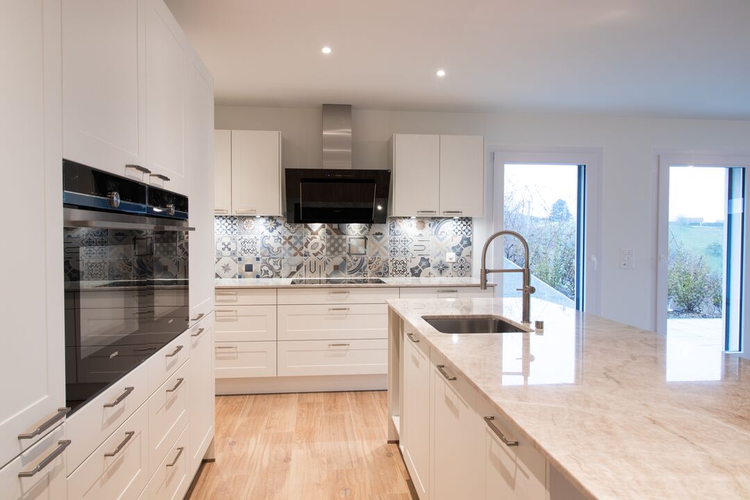 Projet immobilier à Valeyres avec 2 maisons construites, la cuisine