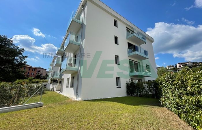 new, small and elegant apartment building in sunny location