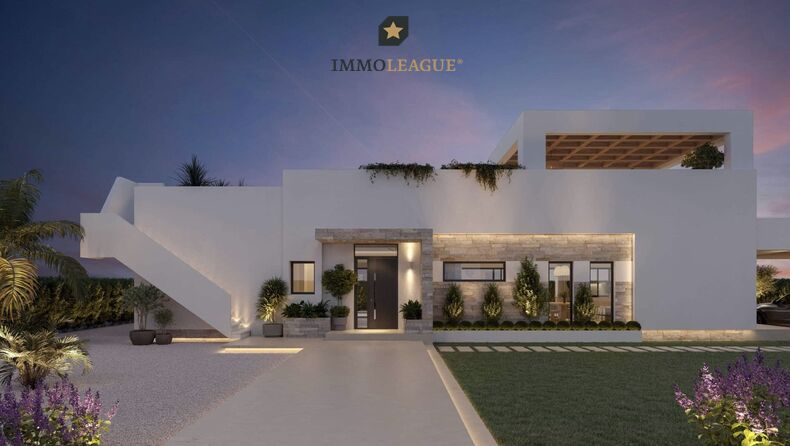 Die modern beleuchtete Eingangszone bildet das Entree der Luxusvilla.