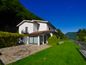 Villa di Lusso con Vista Mozzafiato sul Lago di Lugano a Ruvigliana