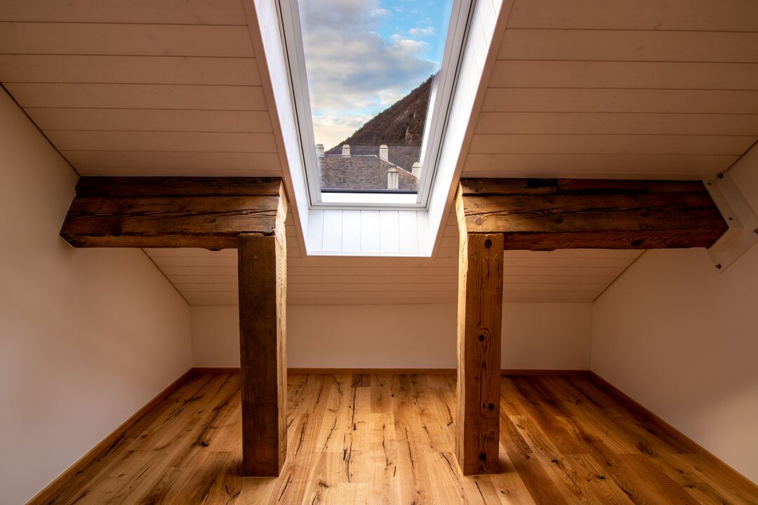 Rénovation d'une ferme du 19e siècle en 15 appartements à Roche : l'intérieur.