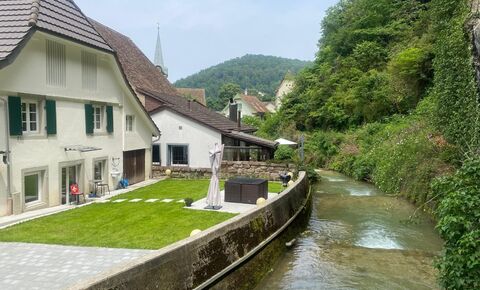 Charming apartment with large garden and parking space