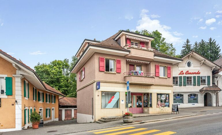 Immeuble de rendement au cœur du village