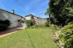 Deliziosa casa con giardino nel nucleo storico del  villaggio al lago