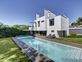 Exclusivité
Magnifique villa contemporaine avec piscine et vue lac