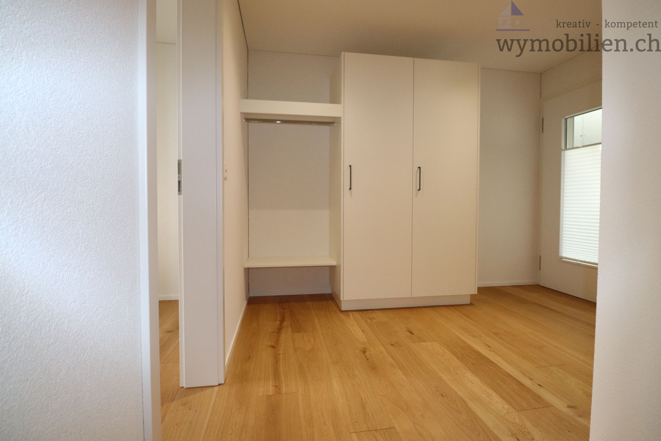 Eingangsbereich mit Garderobe (Musterwohnung))