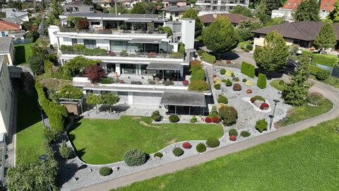 Terrassenhaus mit Alpenblick – stilvolles Wohnen auf höchstem Niveau