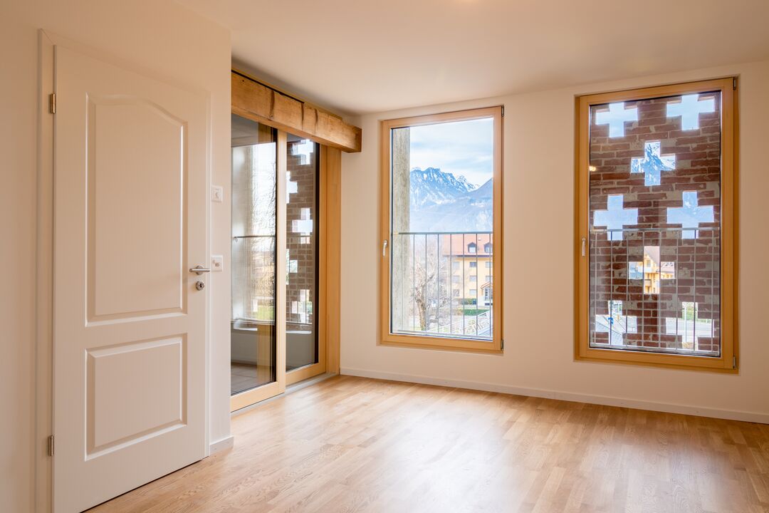 Rénovation d'une ferme du 19e siècle en 15 appartements à Roche : l'intérieur.