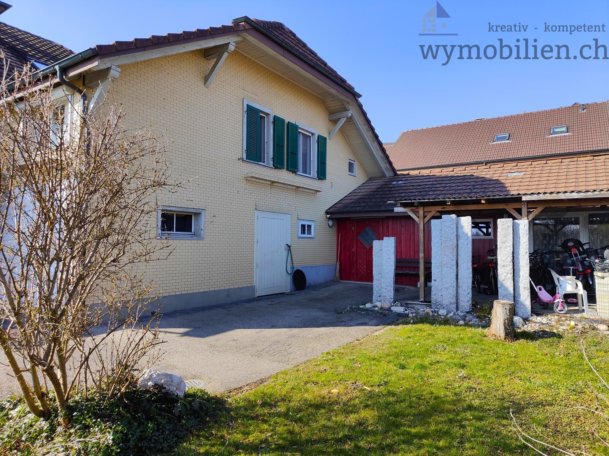 Anbau Ost mit Werkstatt, Sitzplatz, Velo