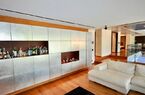 Elegant lake-front apartment with private garden and swimming pool