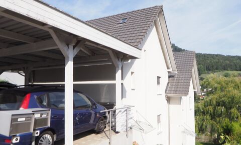 Double family house with garden and double carport