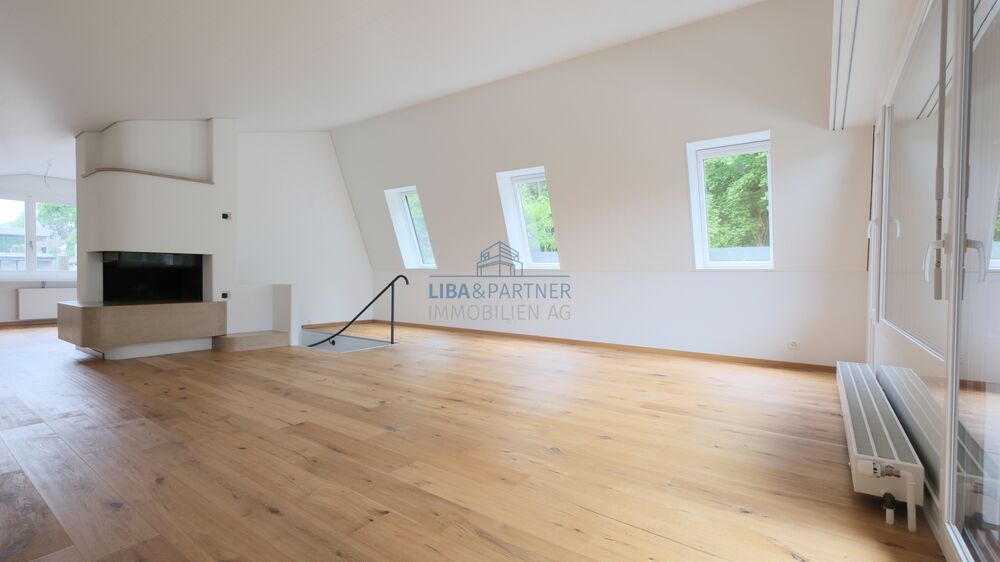 Wohnzimmer mit Kamin