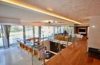 Elegant lake-front apartment with private garden and swimming pool
