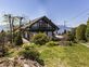 Charmante villa jumelée par les garages avec belle vue sur le lac