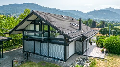 Superbe villa Huf en bois et verre de 6.5 pièces avec vue imprenable