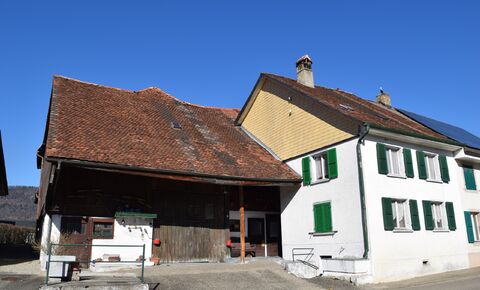 Old village farm with boxes and stables