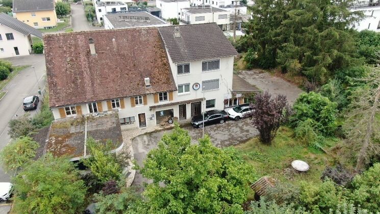 Wohn- und Geschäftsgebäude CH-2842 Rossemaison