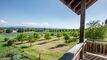 Alpenpanorama in Richtung Süden. Gartensitzplatz und Balkone: Romantische Maisonette in Kirchlindach.