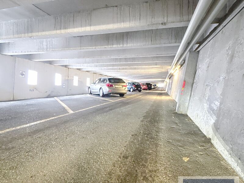 Place de parc couverte aux bâtiments Alpha