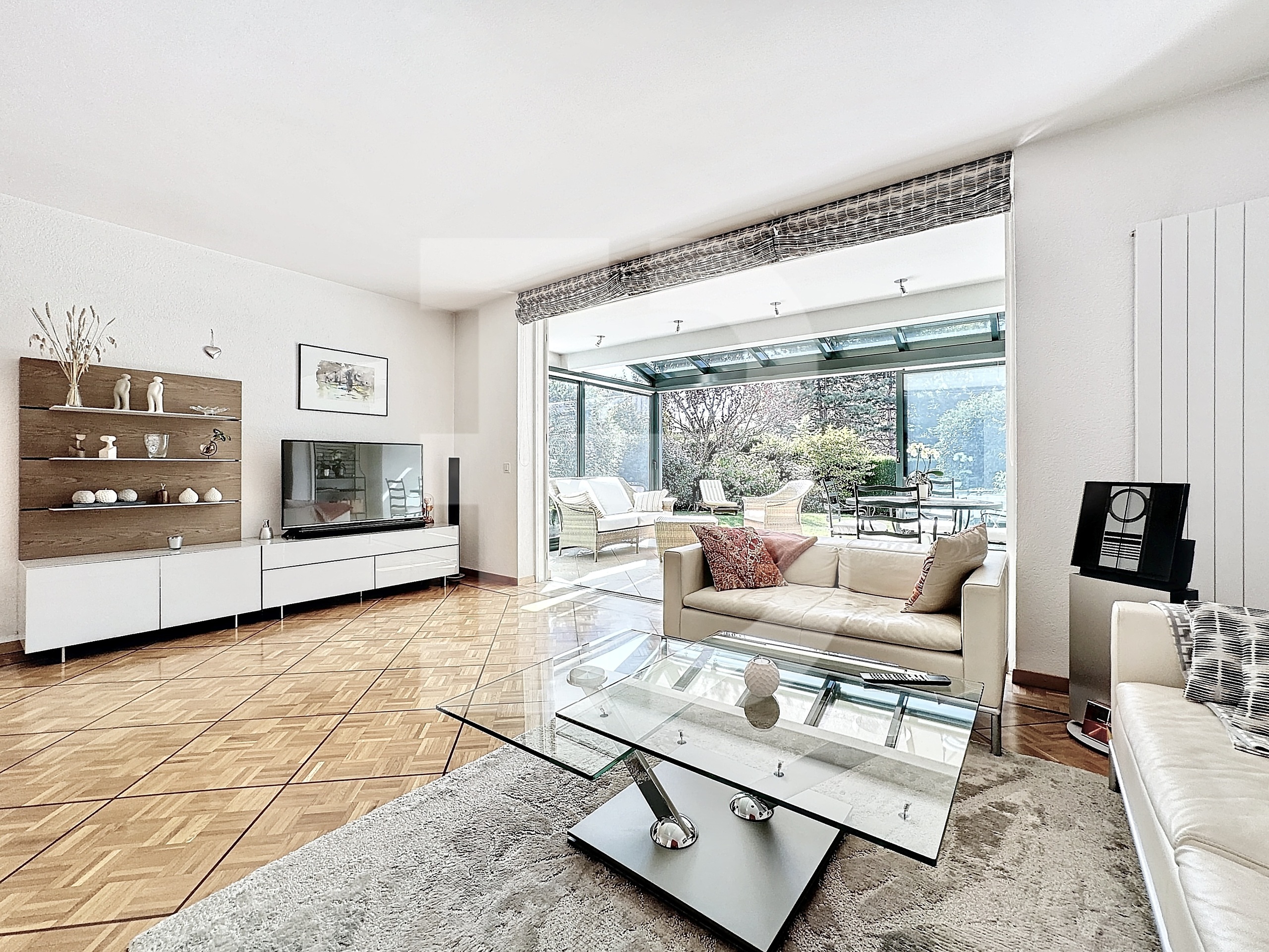 Salon et véranda chauffée  Salon et véranda chauffée