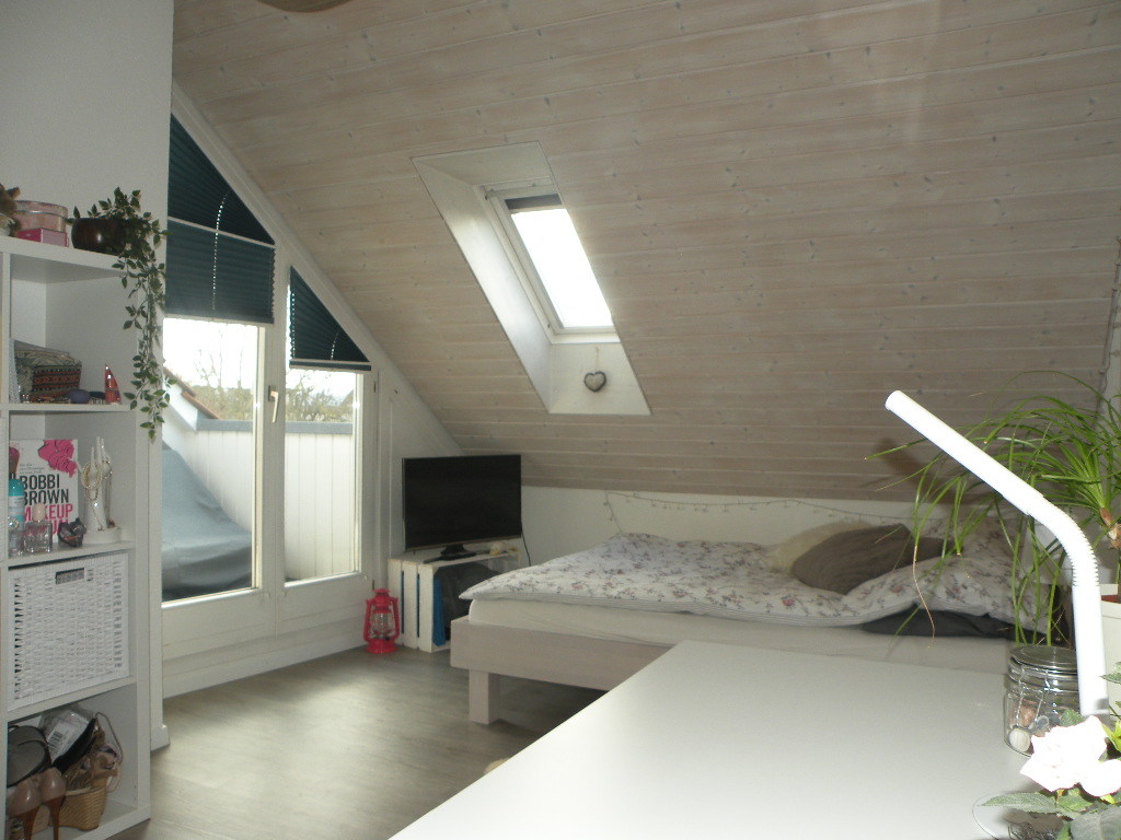 Eines der Zimmer mit Zugang Balkon