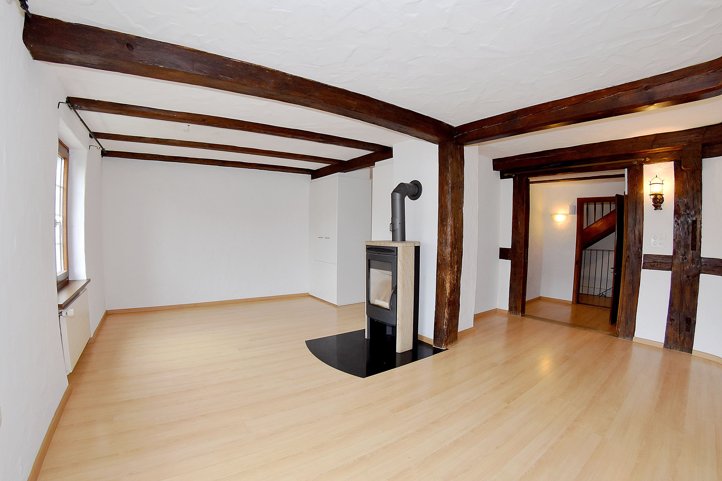 Essbereich mit Cheminée-Ofen Essbereich mit Cheminée-Ofen