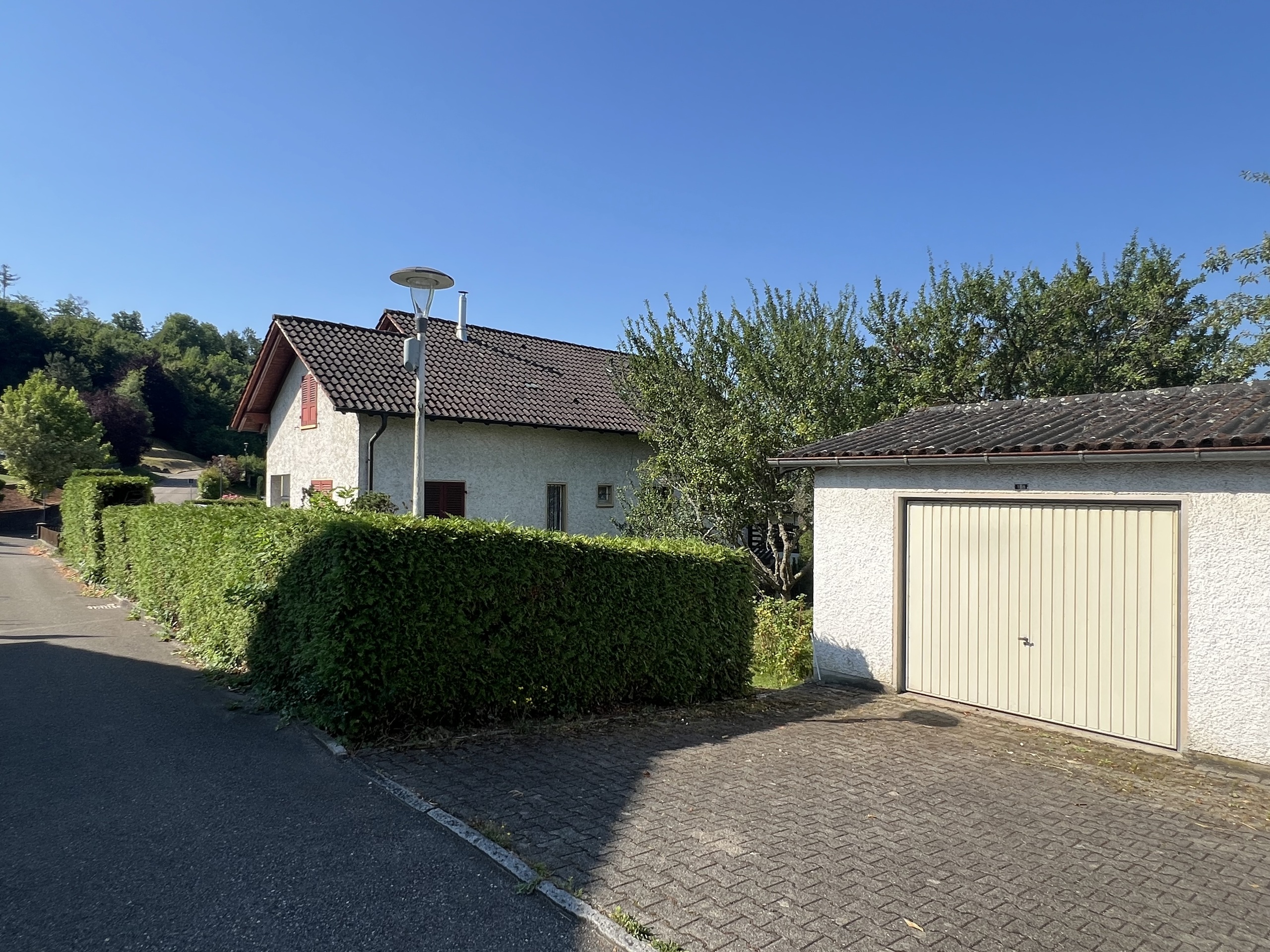 Garage avec accès direct au terrain