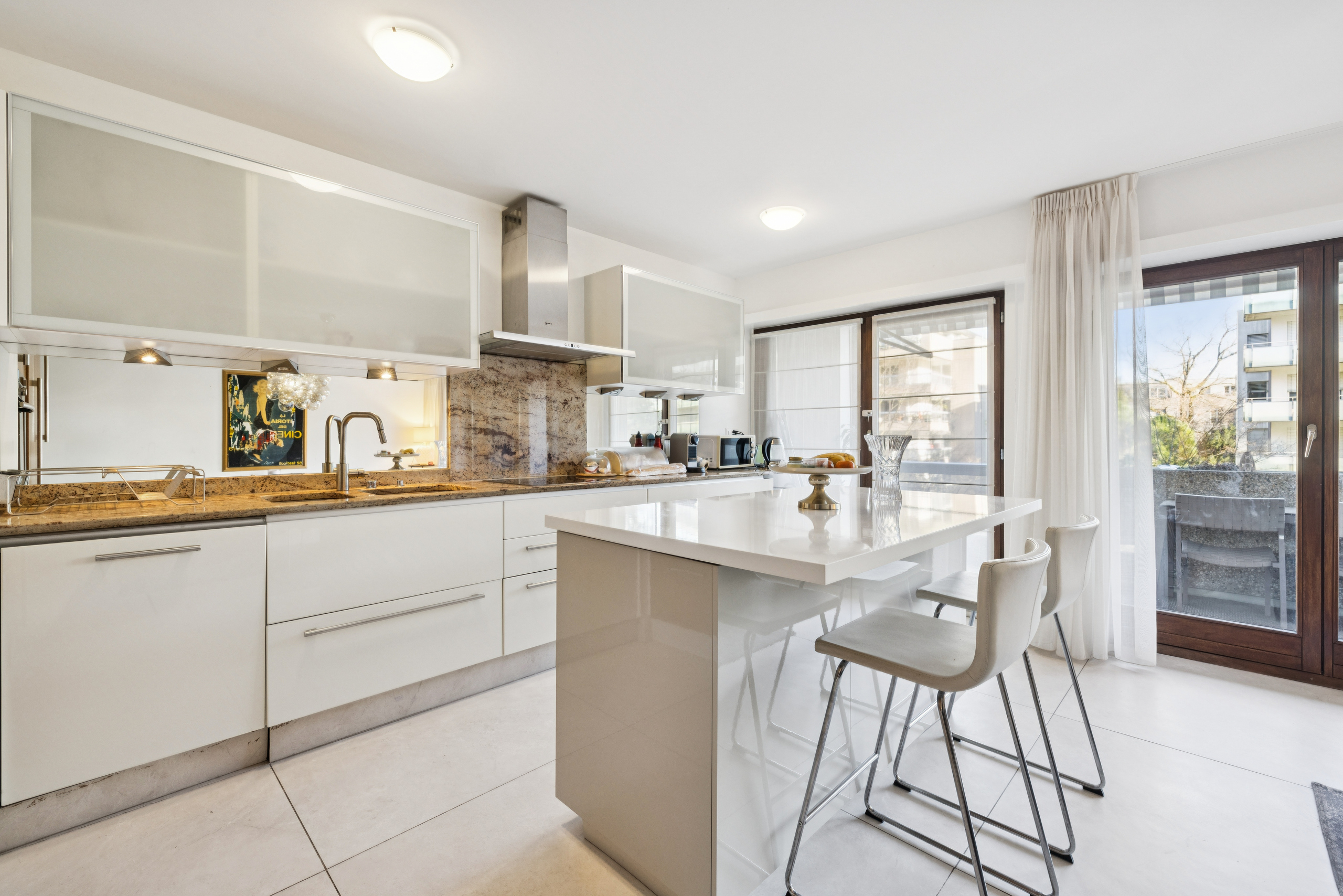 Large, open, fully-equipped kitchen with island