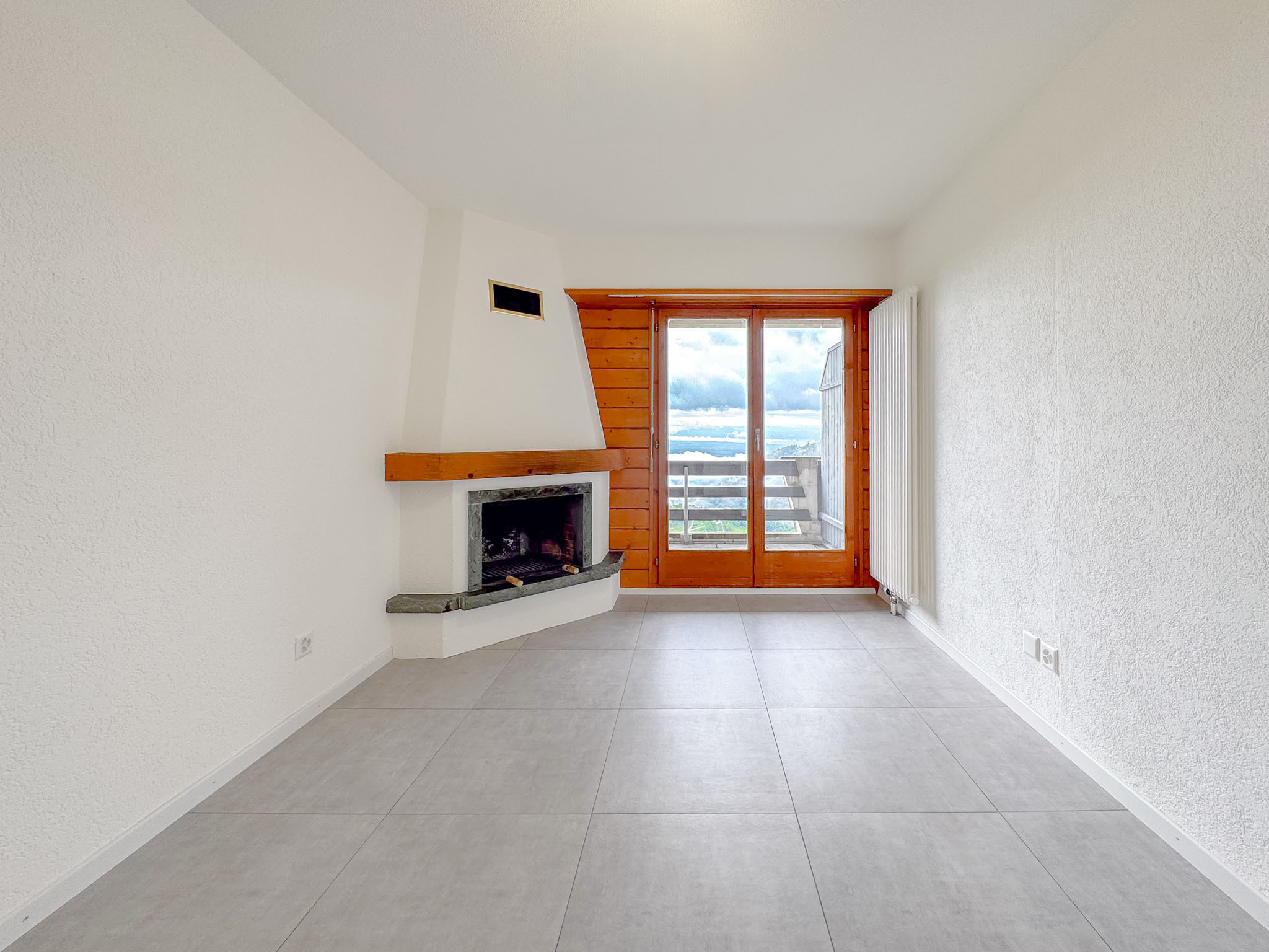 Séjour et accès au balcon Séjour et accès au balcon