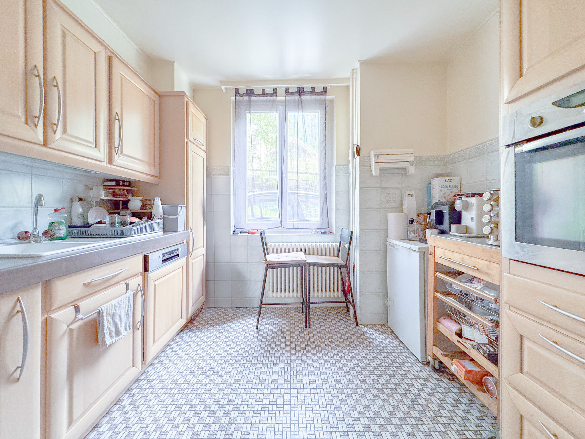 Appt loué au rez : cuisine agencée