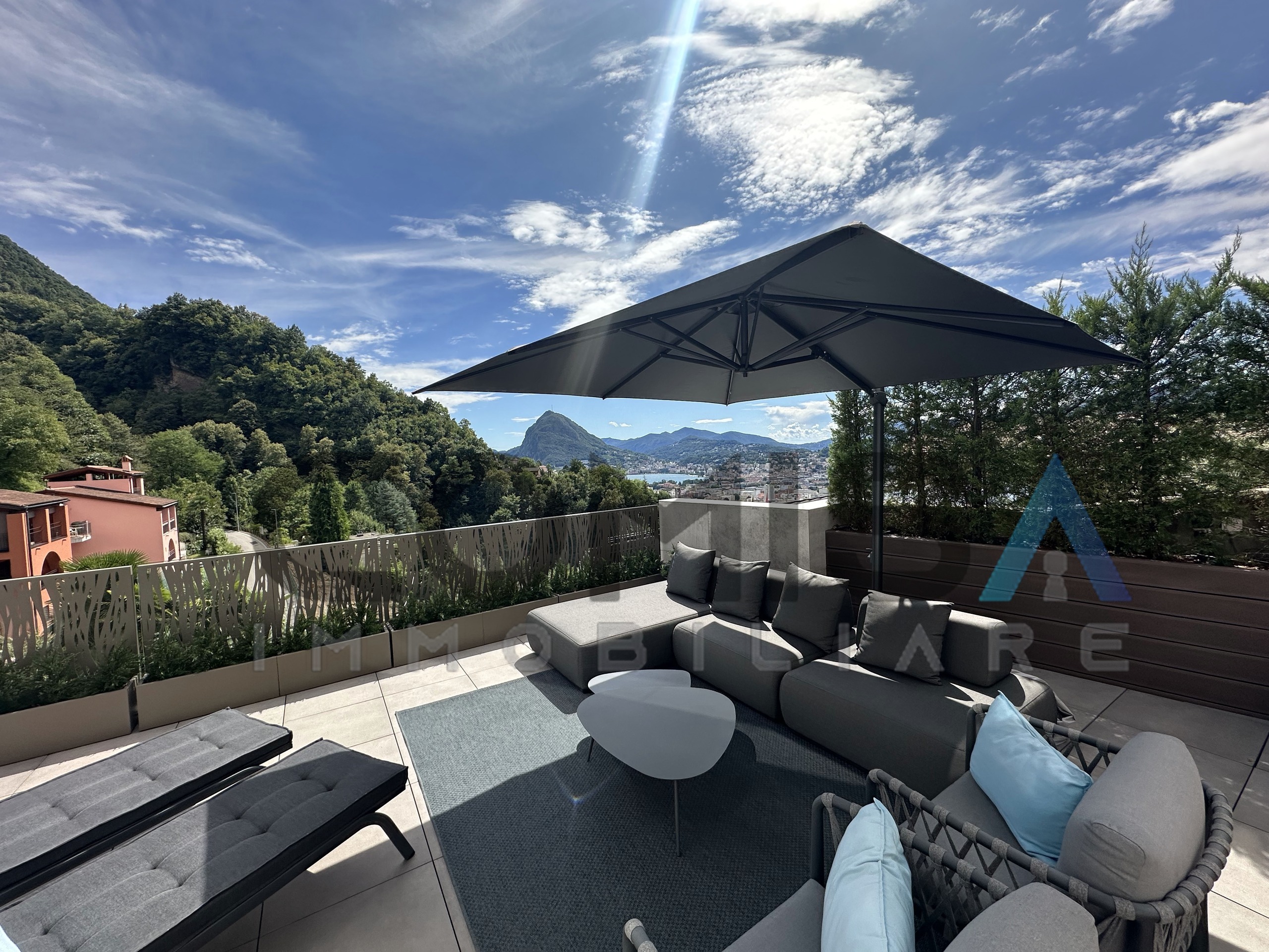 lounge terrace with views of the lake and the city lounge terrace with views of the lake and the city