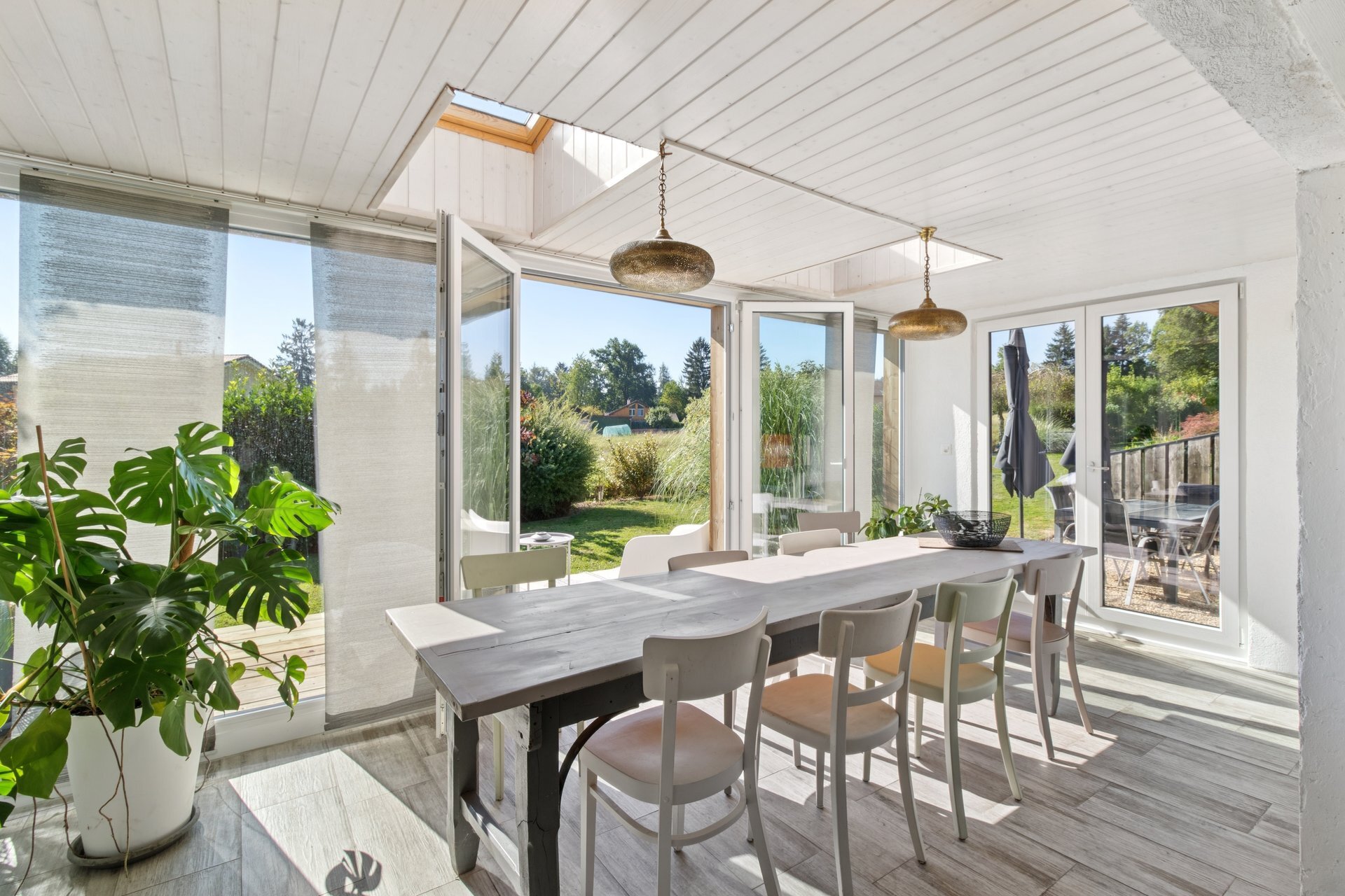 Véranda avec terrasse extérieure