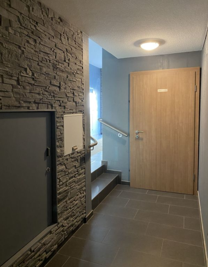 Dévaloir dans les couloirs pour linge sale