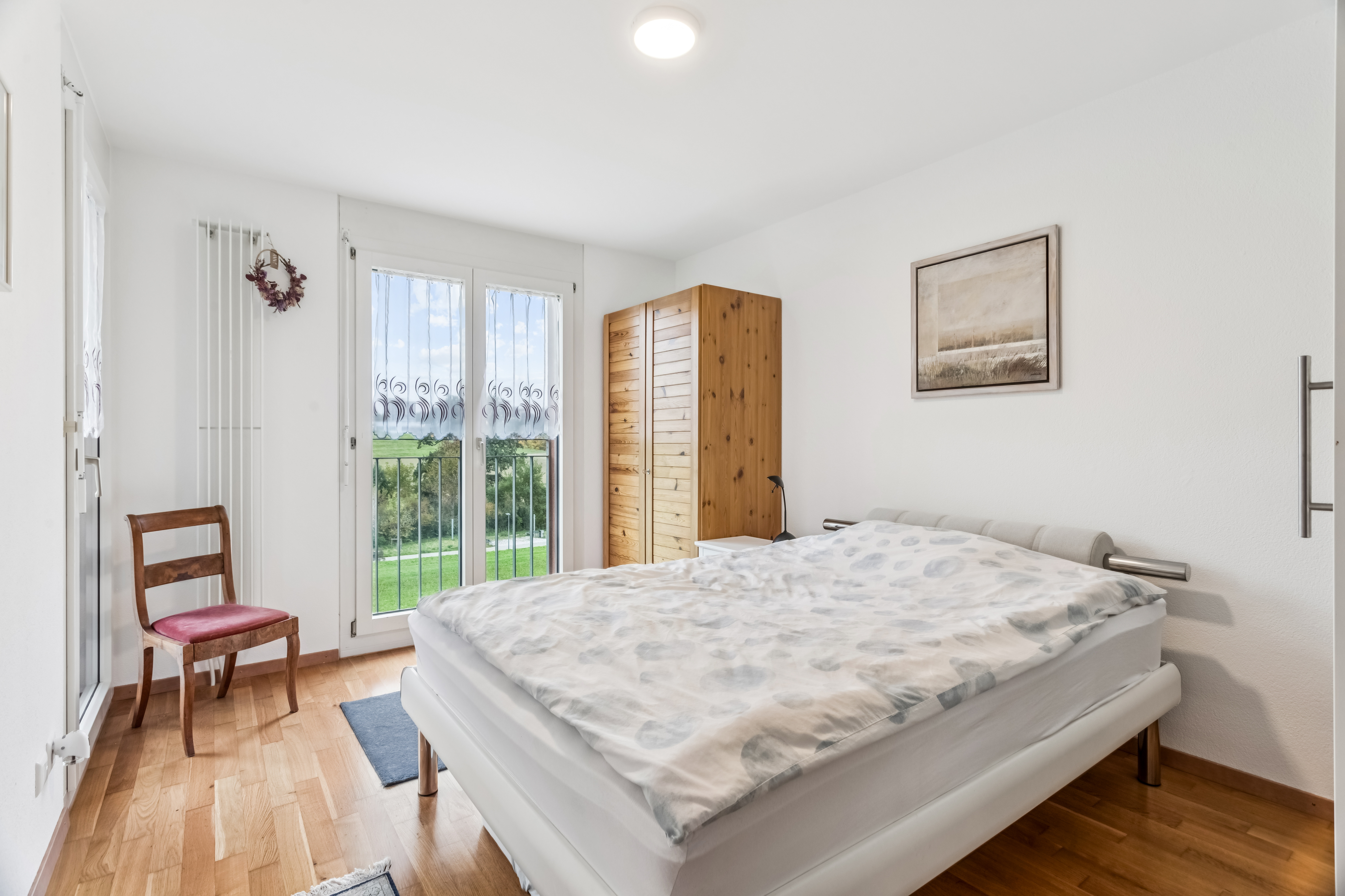 Chambre avec accès au balcon