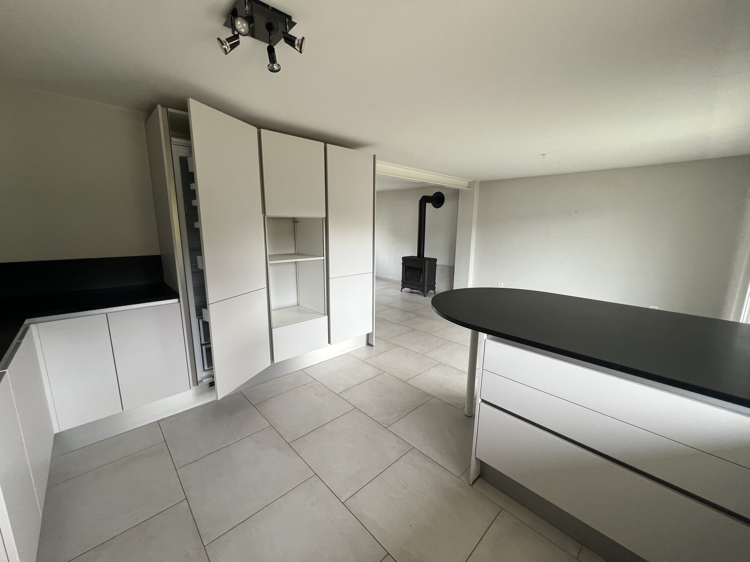 Kitchen opening onto living/dining room Kitchen opening onto living/dining room