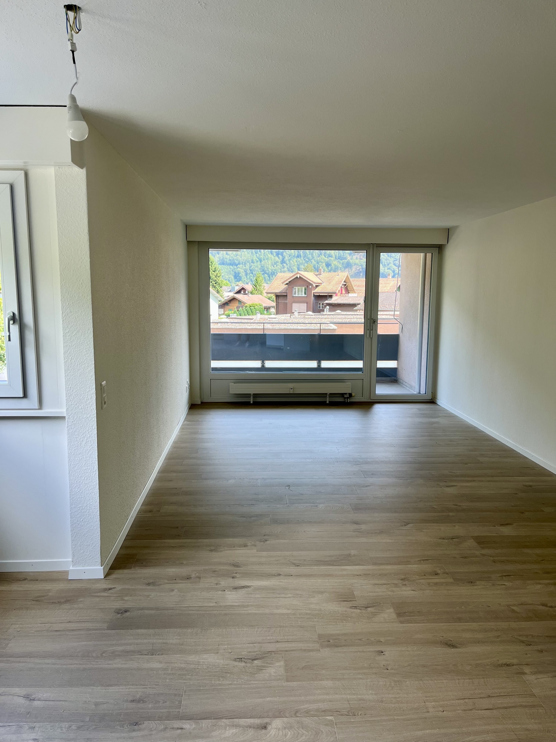 Wohnbereich mit Zugang Balkon