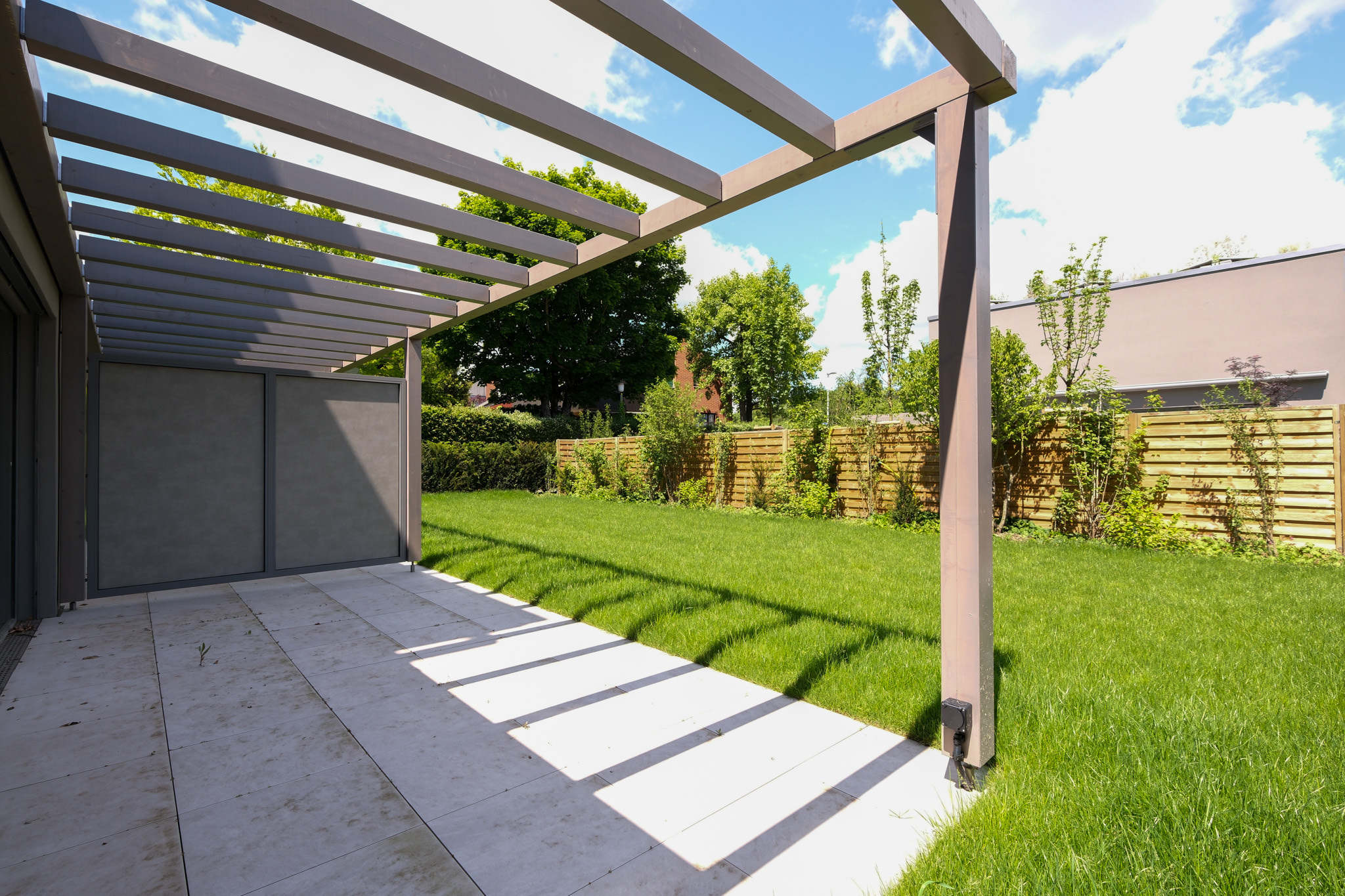Gartensitzplatz mit Pergola