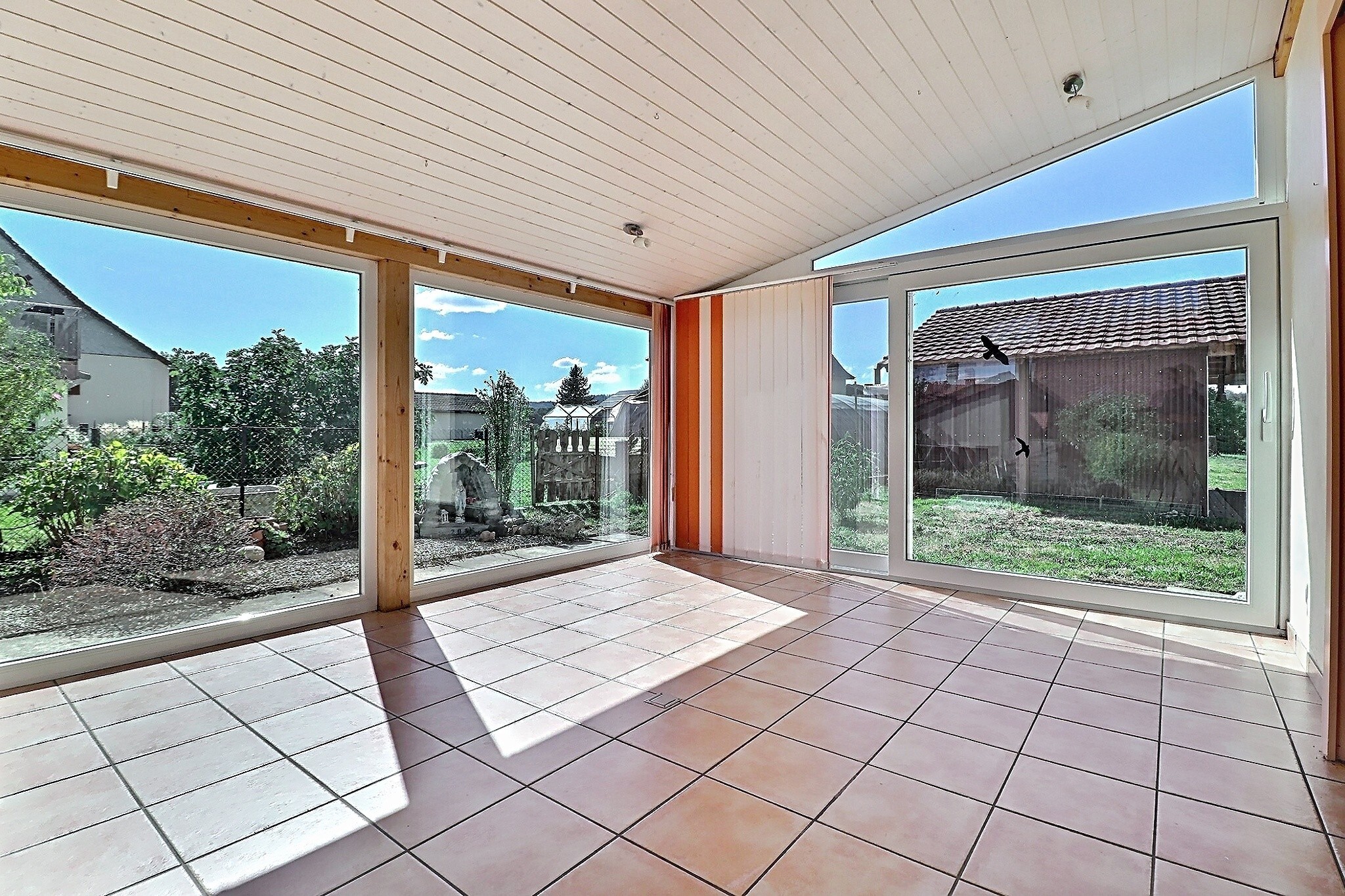 Véranda-appartement du rez-de-chaussée Véranda-appartement du rez-de-chaussée