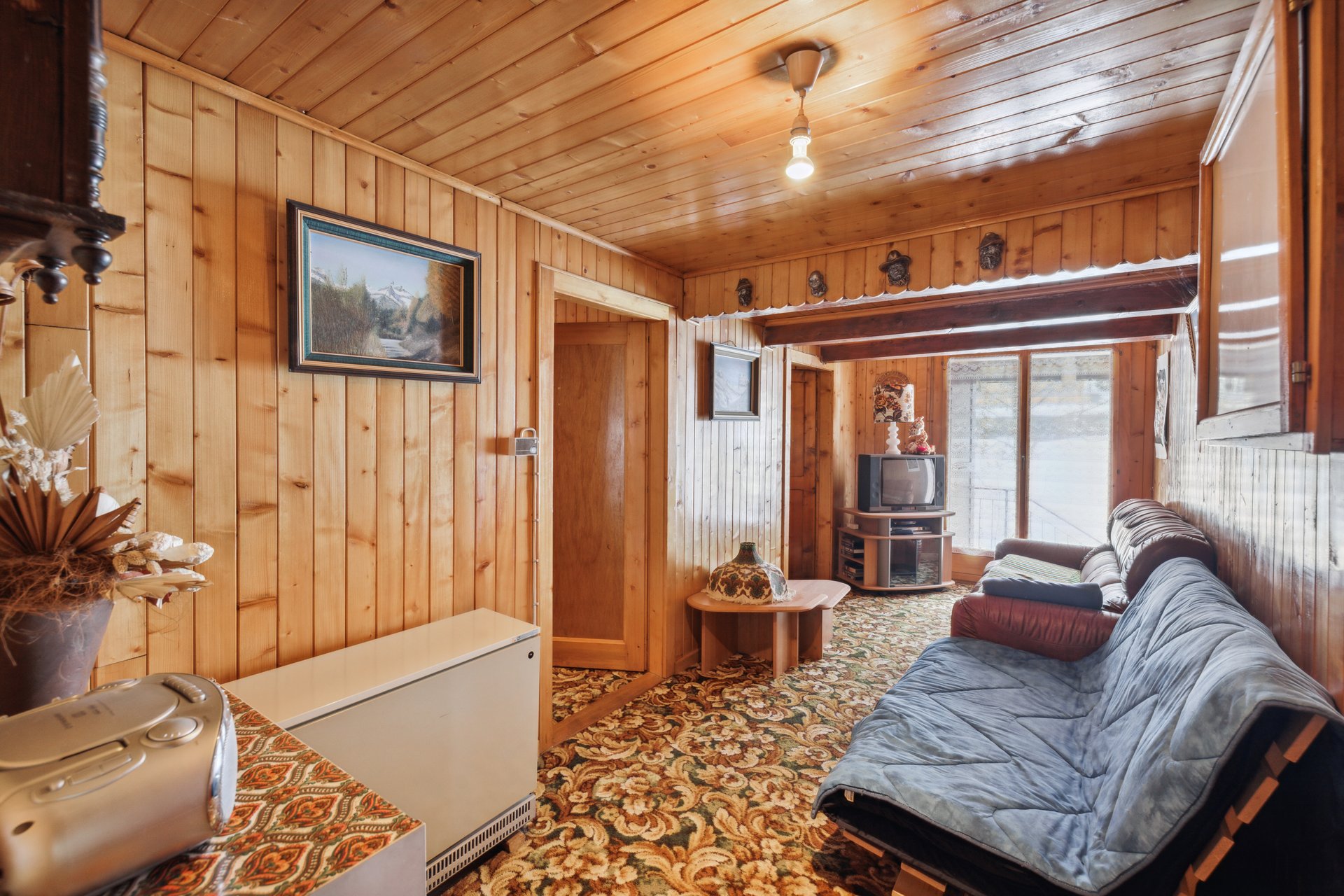 Wohnzimmer mit Balkon/Gartenzugang Wohnzimmer mit Balkon/Gartenzugang