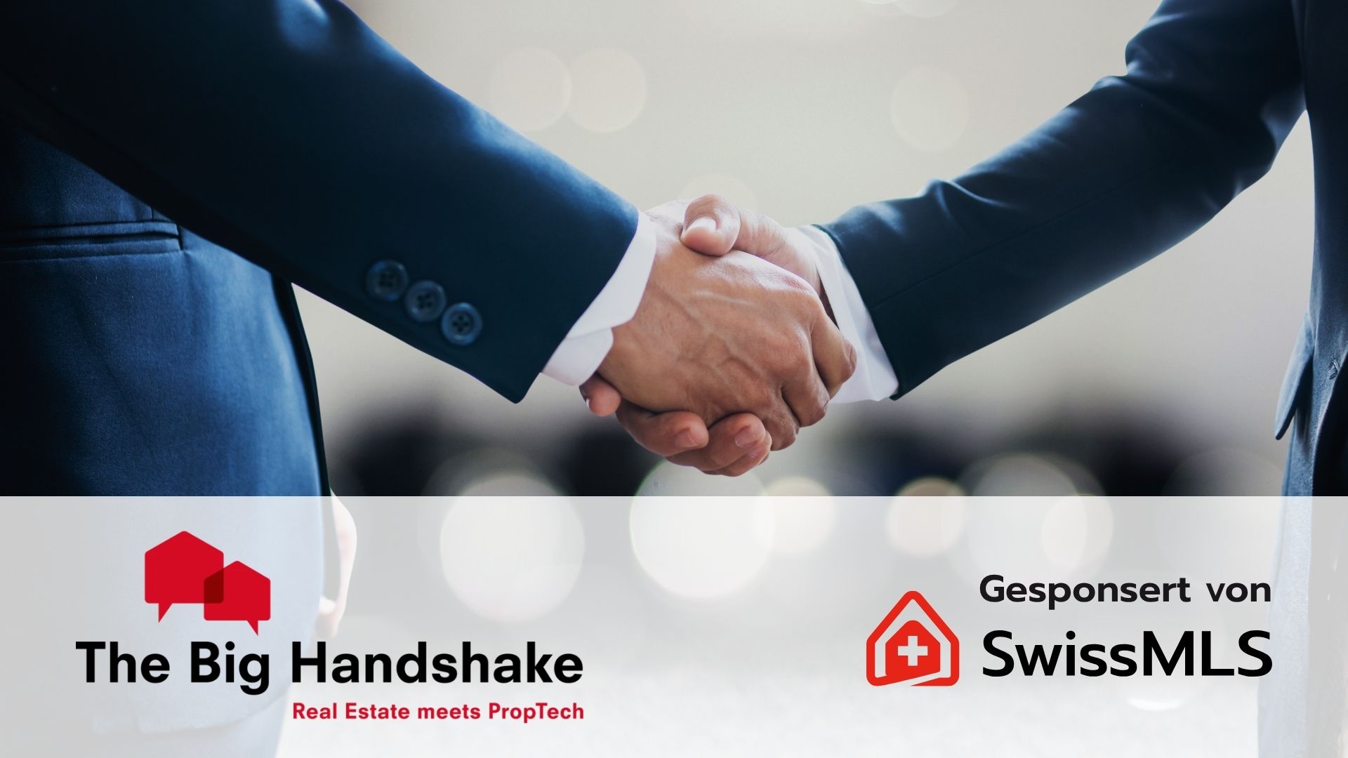 Handschlag zwischen zwei Immobilienprofis während der Veranstaltung The Big Handshake 2026 in Zürich, gesponsert von SwissMLS AG, rund um die PropTech-Innovation und die Digitalisierung der Schweizer Immobilienbranche.