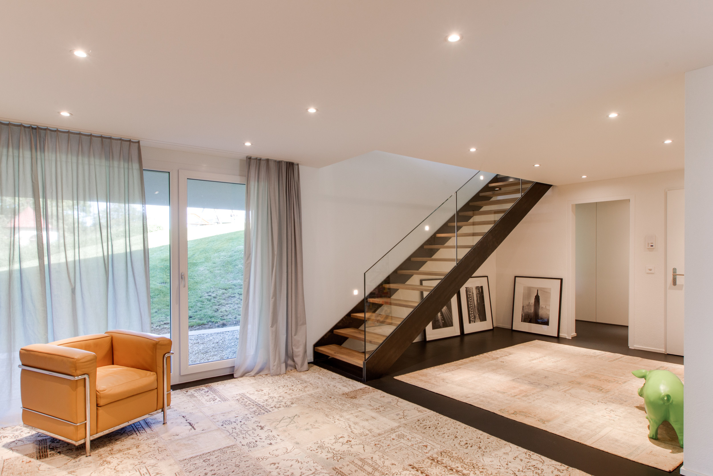 Über die Indoor Treppe gelangen Sie in die untere Ebene Über die Indoor Treppe gelangen Sie in die untere Ebene