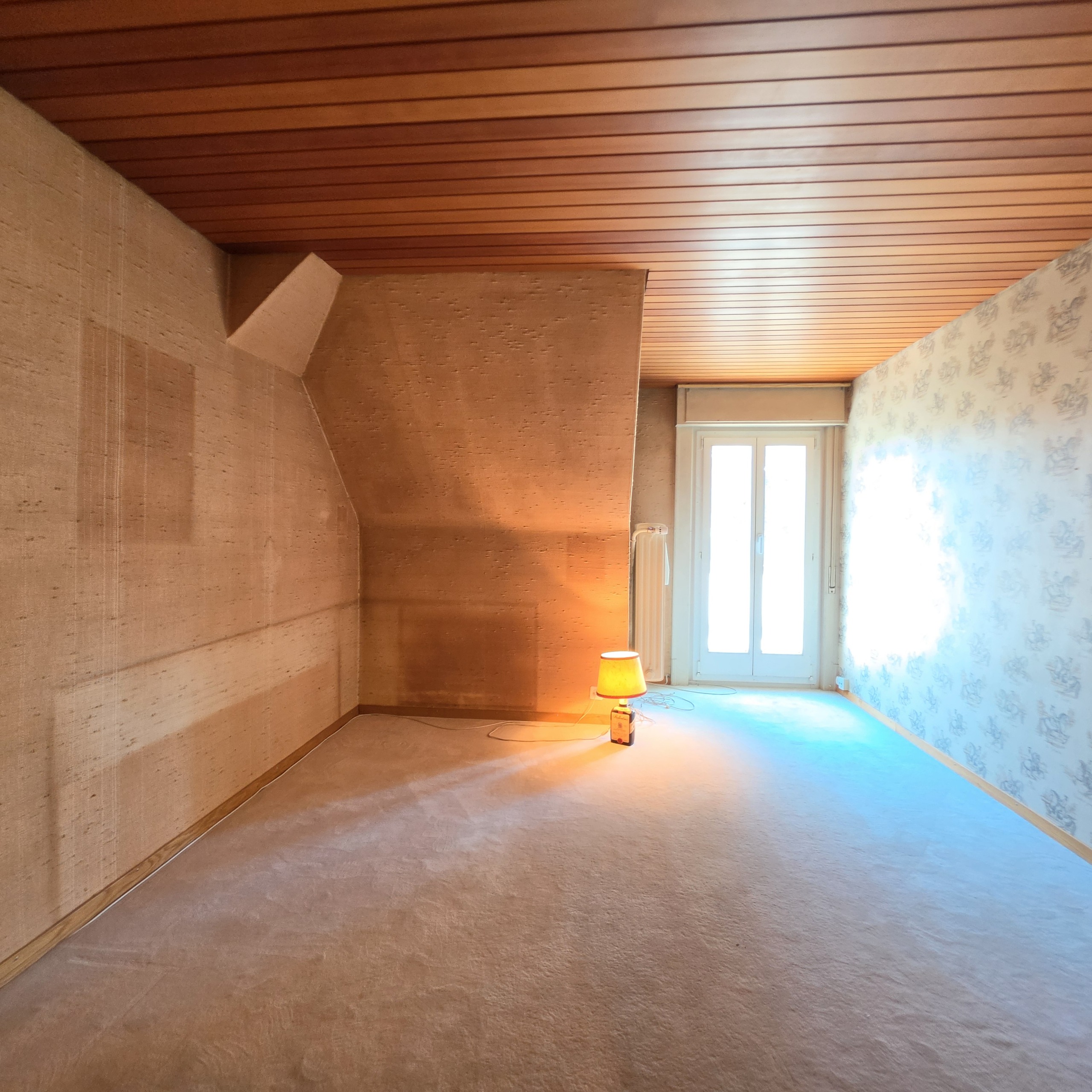 Combles: chambre 1 donnant sur le balcon