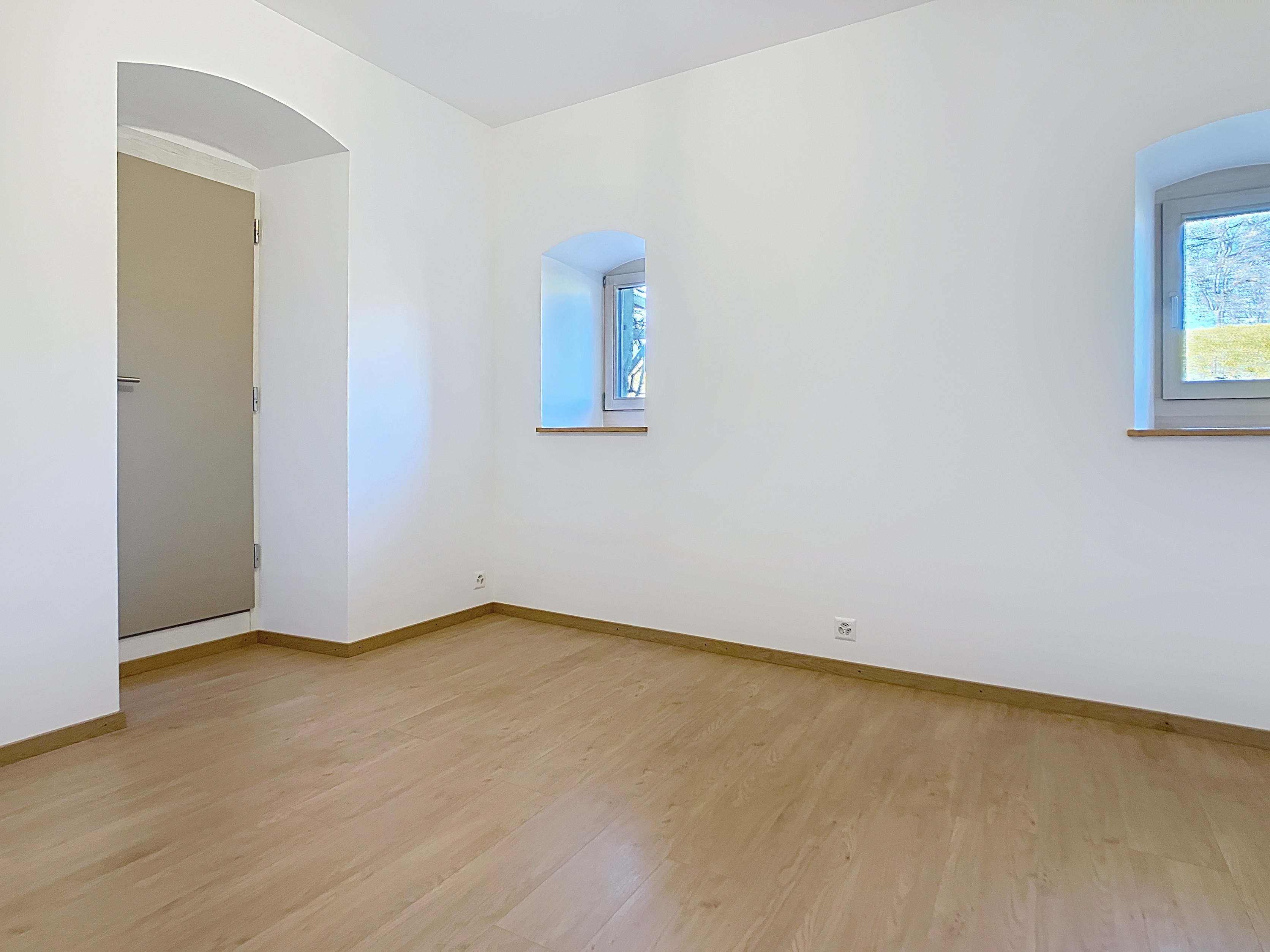 Chambre avec accès à la terrasse couverte