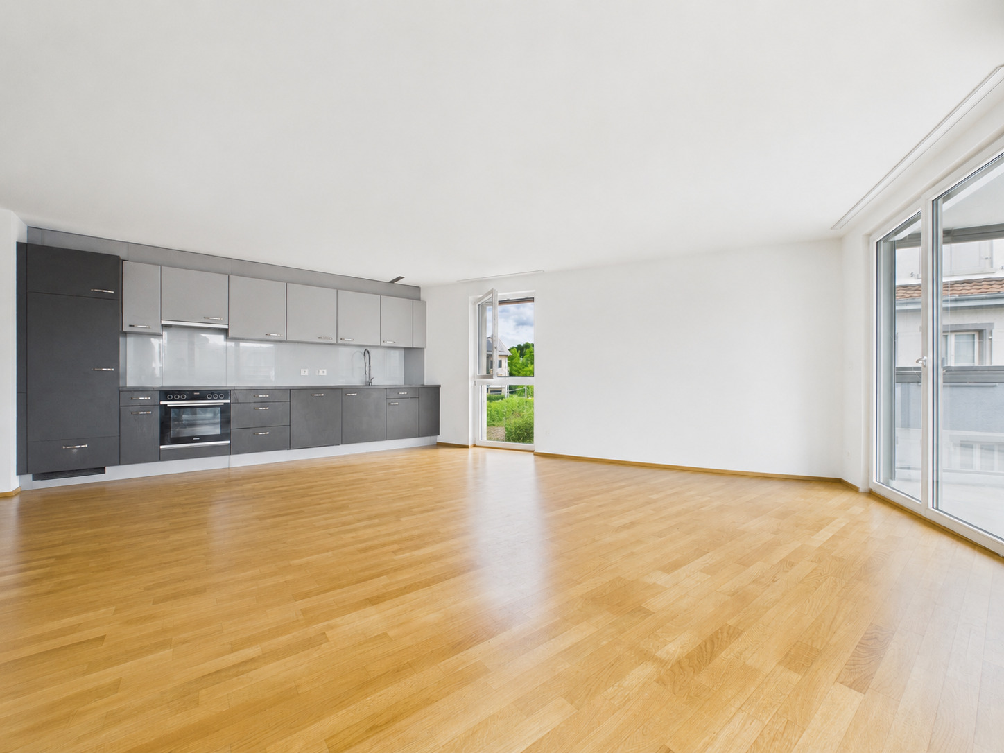 Wohnzimmer mit offene Küche