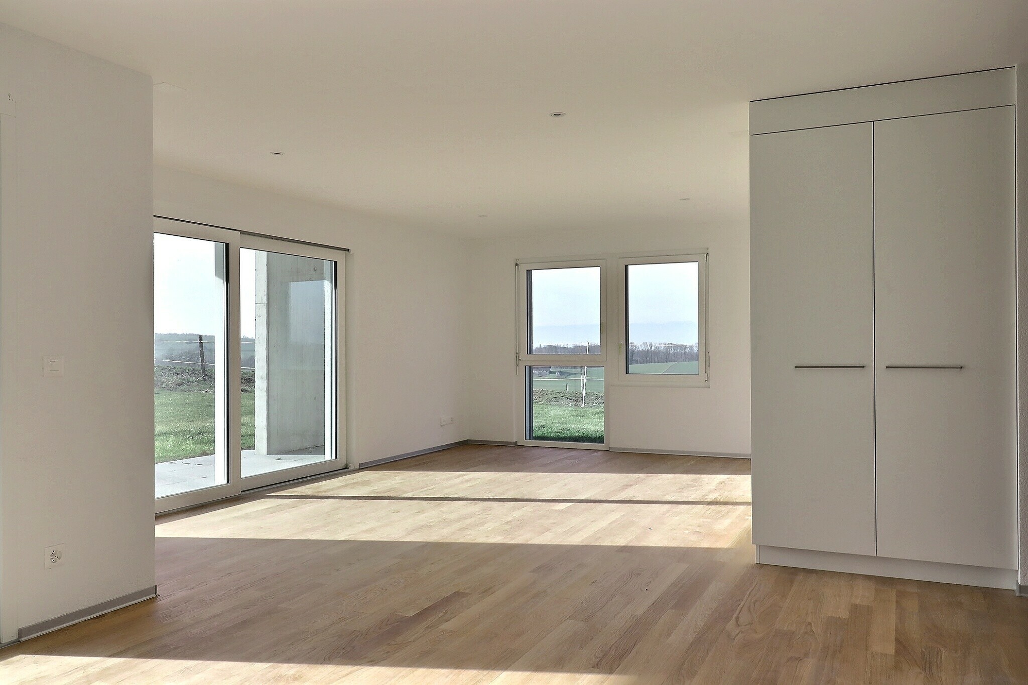 Séjour avec accès terrasse et jardin Séjour avec accès terrasse et jardin