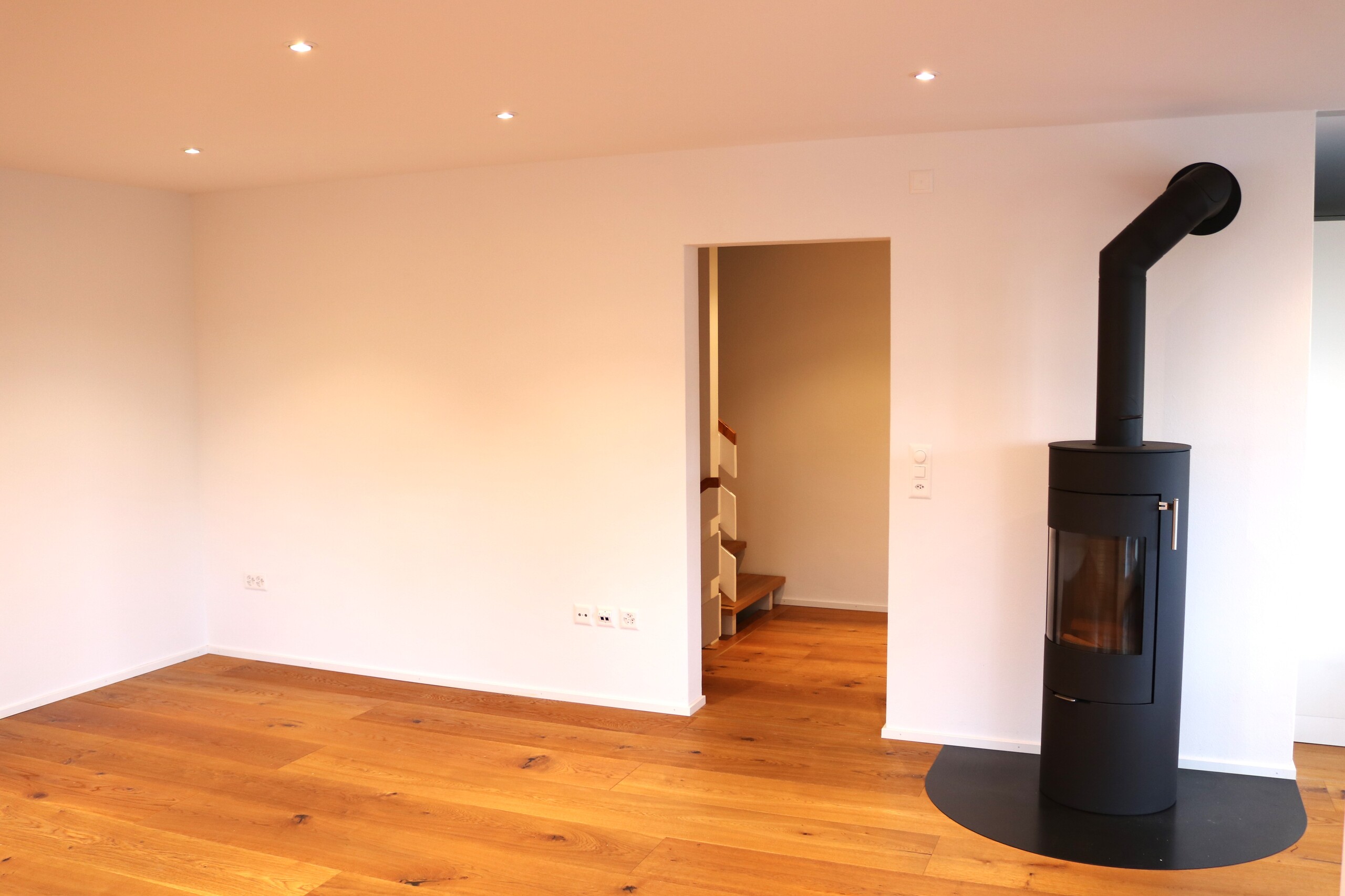 Wohnzimmer mit Cheminéeofen