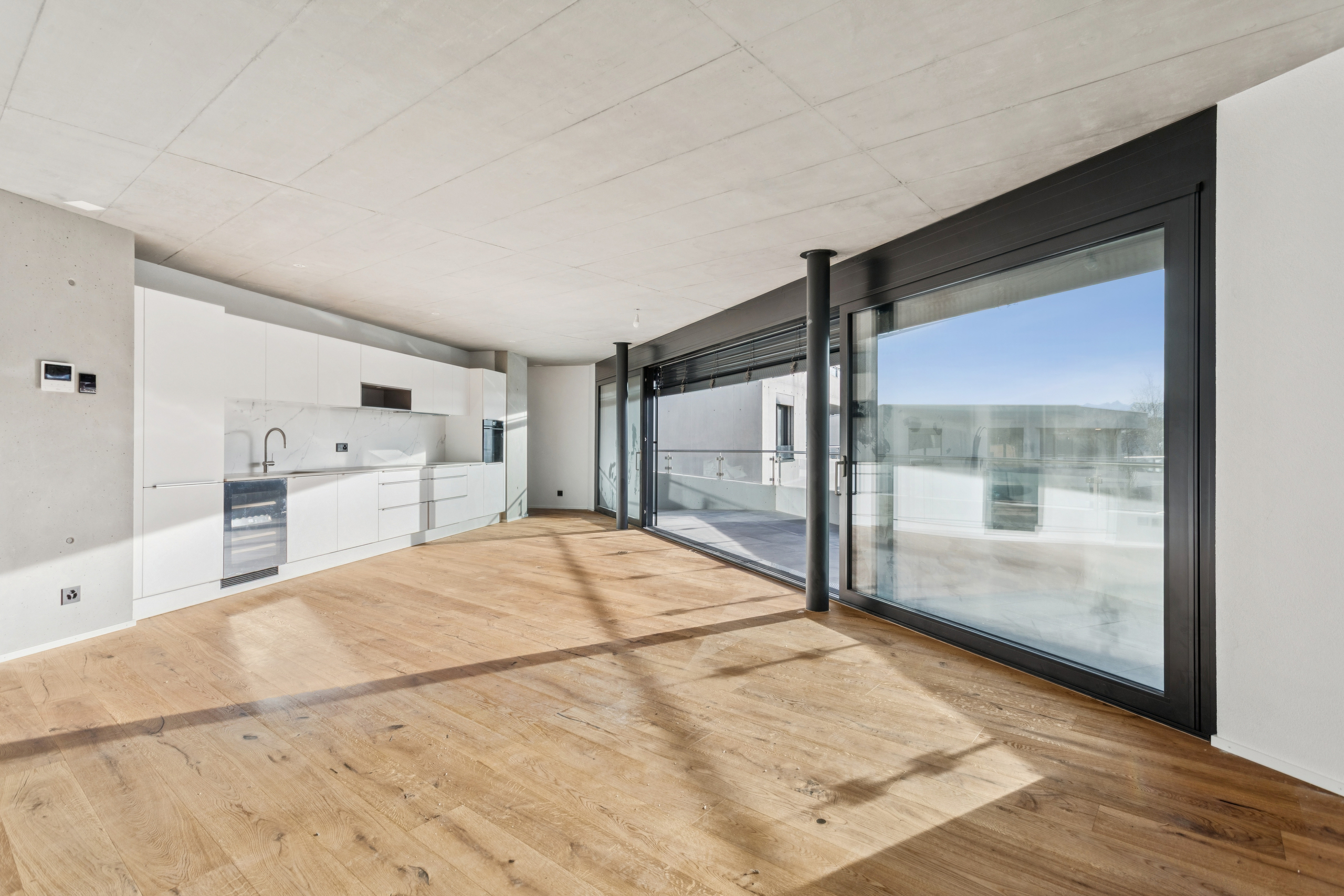 La pièce à vivre avec cuisine ouverte