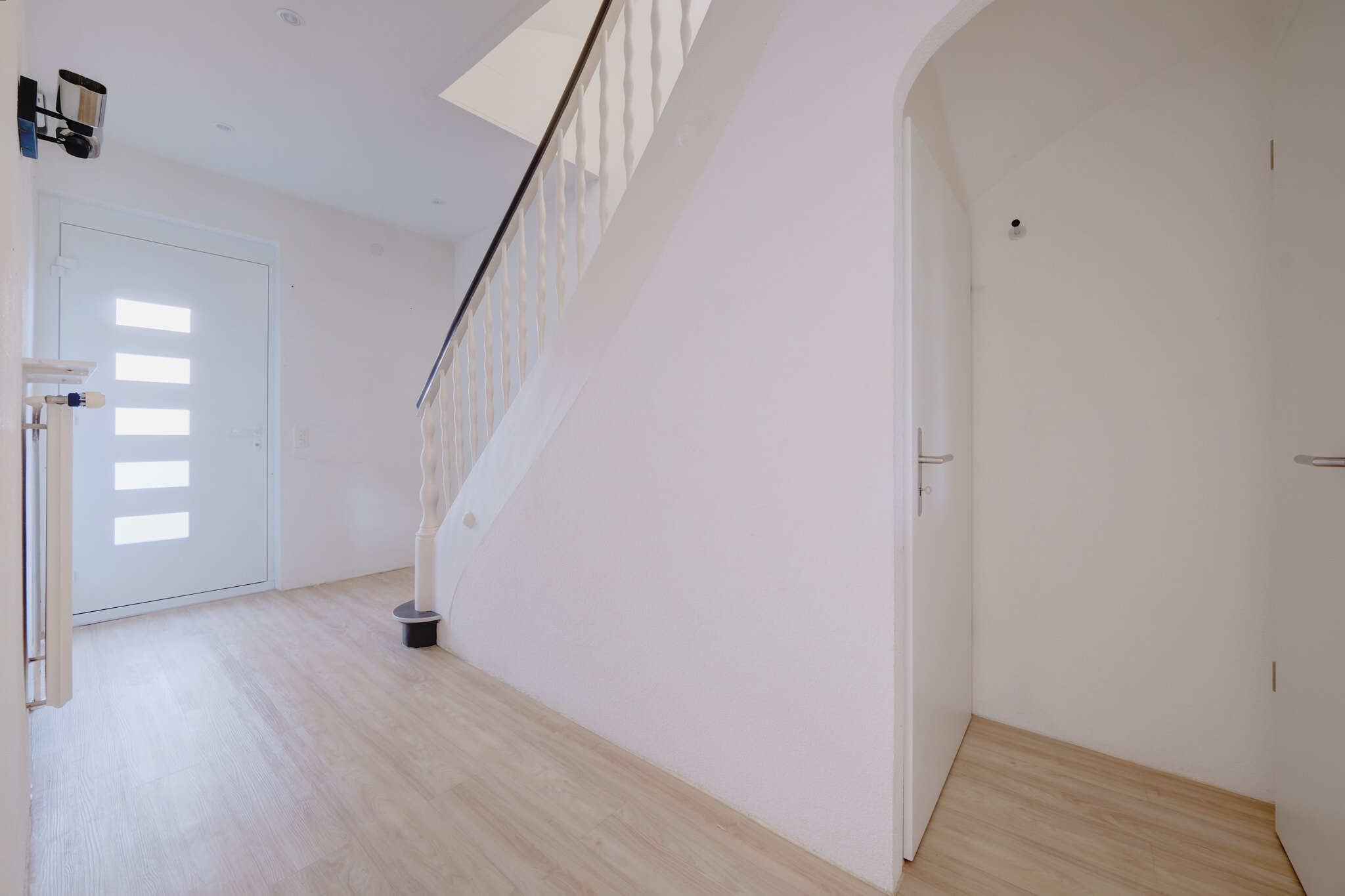 Eingangsbereich mit Treppe ins Obergeschoss